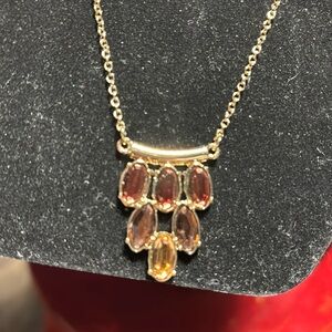 Avon topaz “color” necklace and earrings in gold tone.